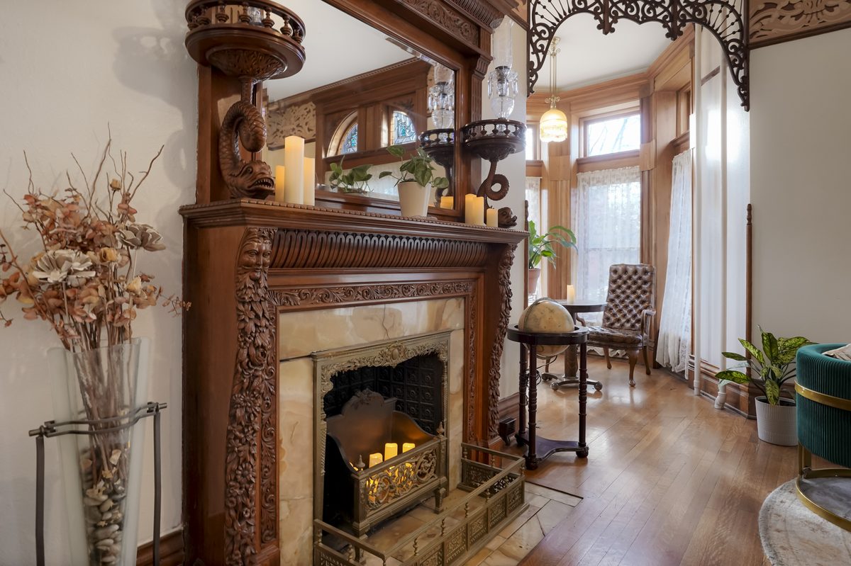 The Green Man fireplace carving at Castle Marne